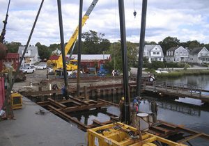 Workers Replacing Shiplift Next to Dock Near Bridgeport, CT