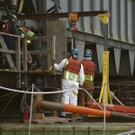 BAC workers organizing bridge construction