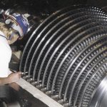 BAC technician at work on steam turbine